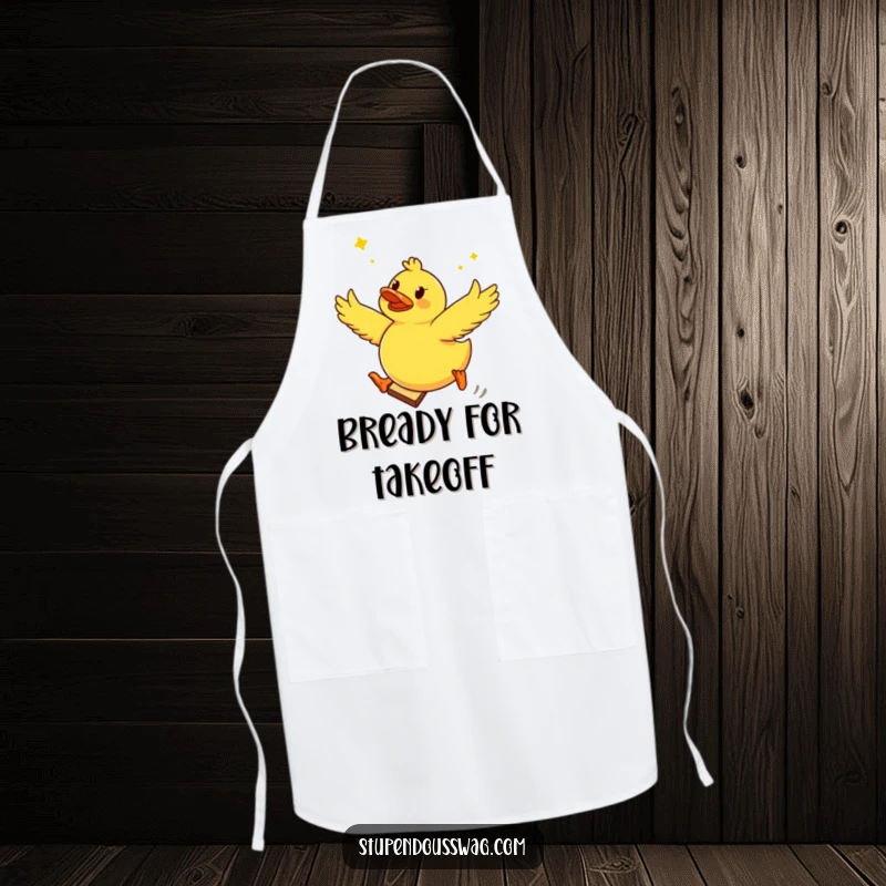 Funny apron featuring a brave rubber ducky launching from a slice of toast, ideal for culinary adventures with a humorous twist.