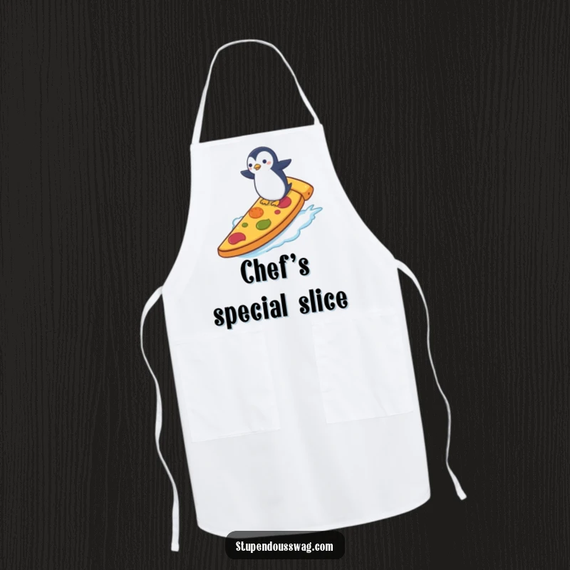 Funny apron showing a tiny penguin surfing a giant slice of pizza, ideal for chefs who enjoy humorous and adventurous kitchen wear.