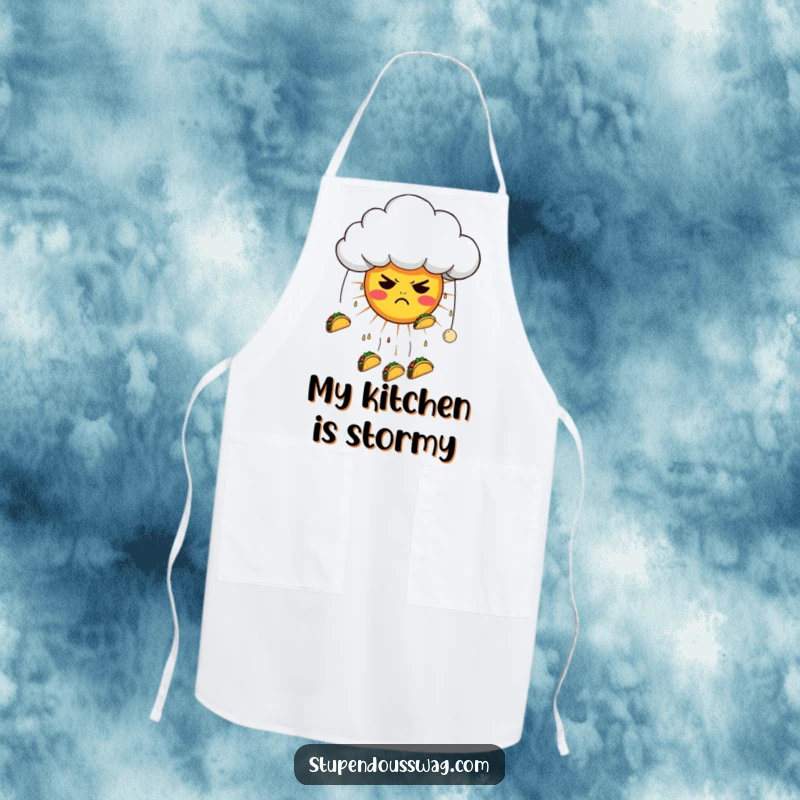 Funny apron depicting a grumpy cloud raining tacos on a confused sun, great for protecting clothes with a humorous kitchen accent.