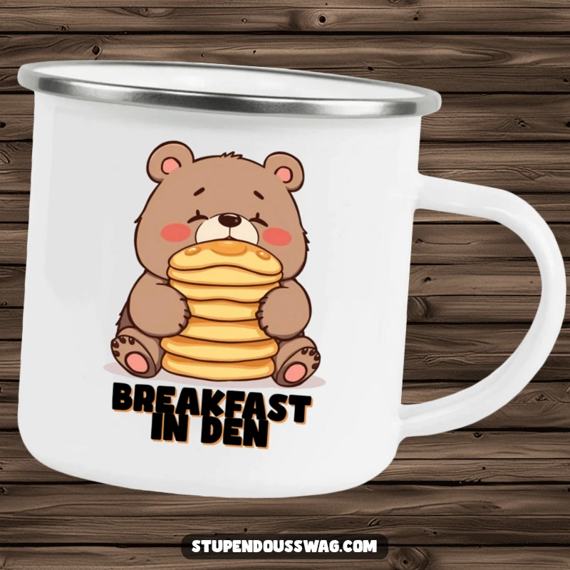 A funny camping mug with a clumsy bear balancing pancakes, designed for outdoor enjoyment and a good dose of humor.