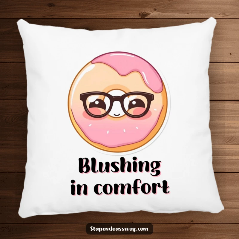 Funny pillow displaying a shy donut wearing glasses, blushing gently, offering comfort and sweet amusement.