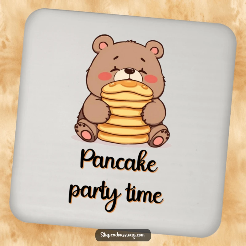 A decorative coaster featuring a clumsy bear balancing pancakes, offering surface protection with a whimsical and funny design.