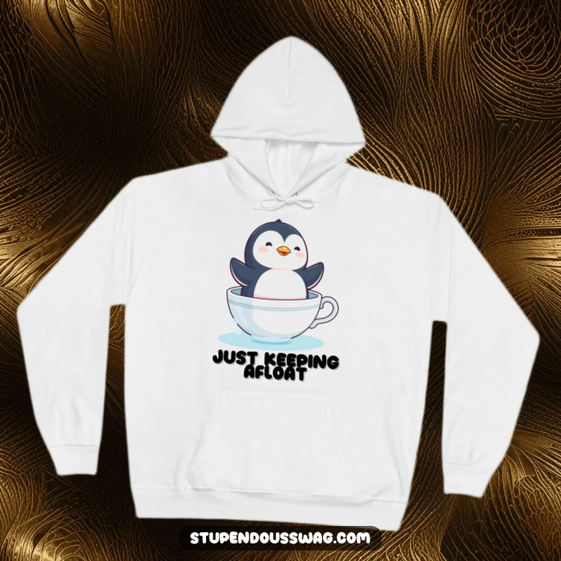 Funny dizzy penguin hoodie depicting a comical bird sailing in a teacup, offering warmth and humor as a gift.