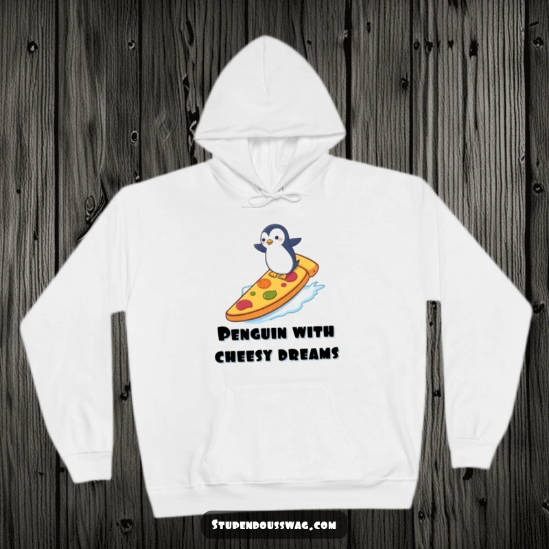 Funny hoodie depicting a small penguin surfing a giant slice of pizza, perfect for staying warm and chuckling during cold days.