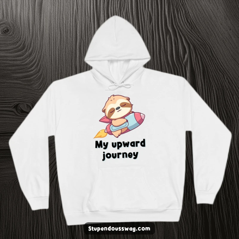 Funny hoodie with a sleepy sloth wearing a jetpack, accidentally zooming upwards, embodying comfy escapes.