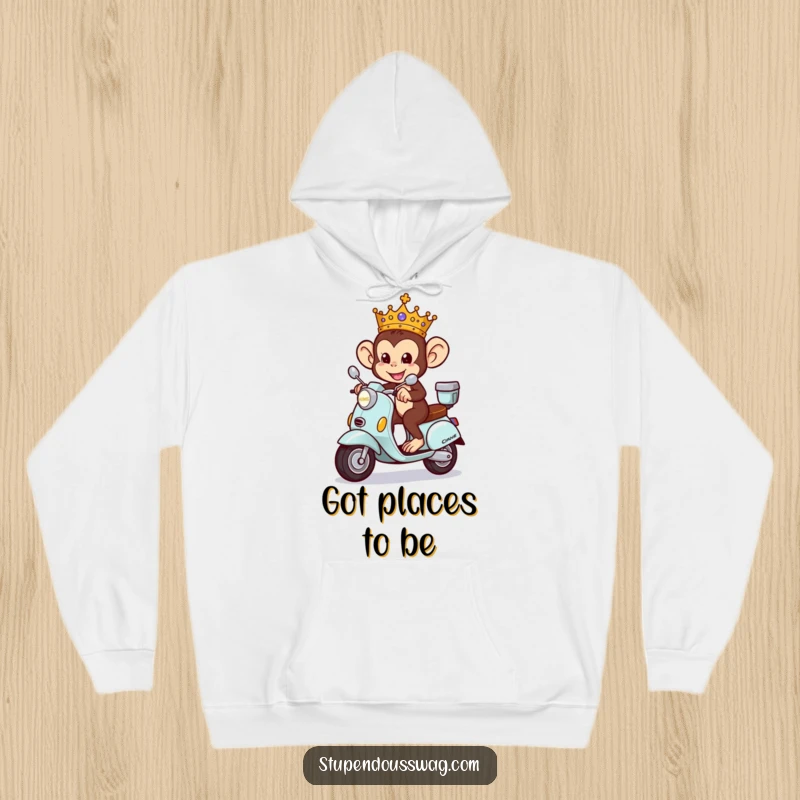 Funny Monkey King Hoodie featuring a mischievous, crowned monkey riding a tiny ornate scooter, perfect for cozy days.