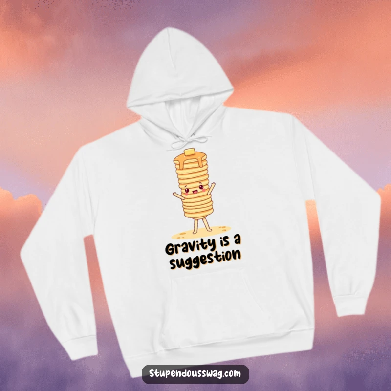 Funny hoodie depicting a stack of pancakes attempting a wobbly handstand, celebrating breakfast fun.