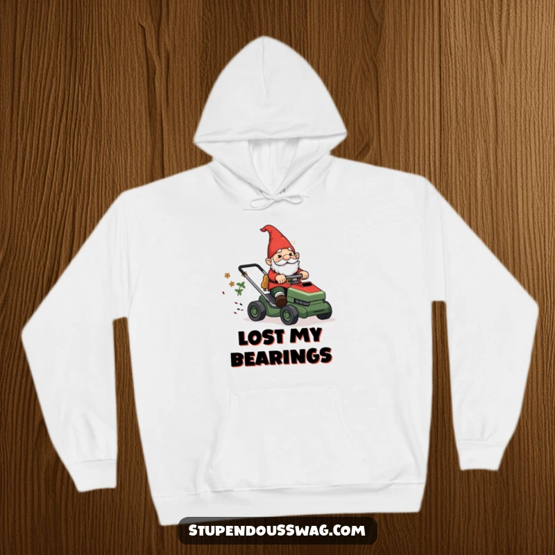 Funny Hoodie: A garden gnome looking bewildered while riding a runaway lawnmower, embracing garden chaos.