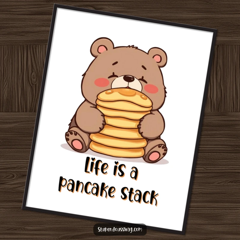 Funny Free Printable Wall Art depicting a clumsy bear attempting to balance a tall stack of pancakes on its nose.