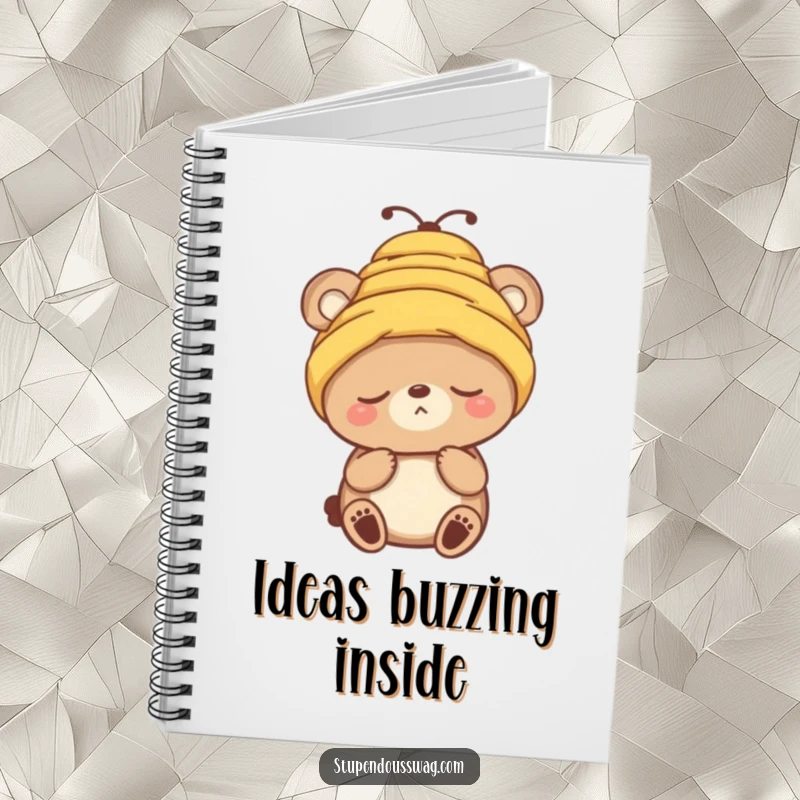 Funny notebook with a sleepy bear character hilariously sporting a beehive as a hat, encouraging creative writing.