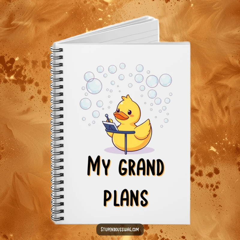 Funny rubber duck conducting a bubble orchestra, a cute notebook for jotting down thoughts.