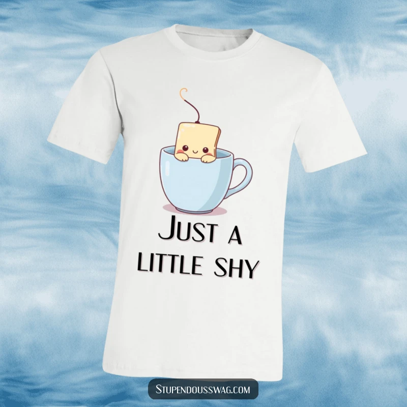 Funny t-shirt with a shy teabag peeking from a steaming mug, representing relatable introversion and the comfort of a warm drink.