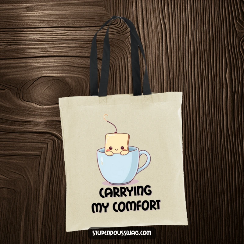 Funny tote bag with a shy teabag peeking from a steaming mug, ideal for carrying essentials and showcasing introverted tea preferences.