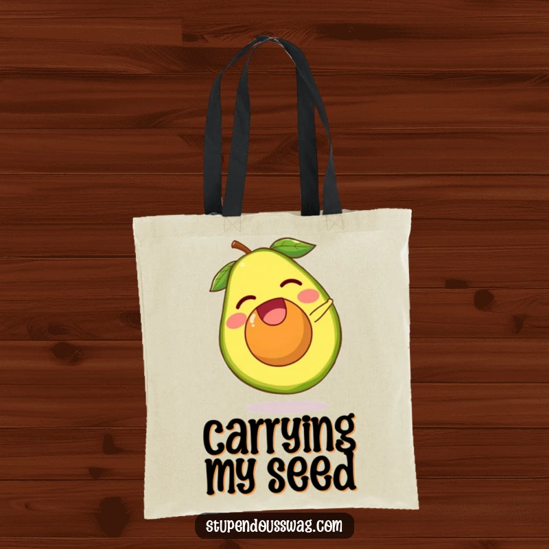 Funny avocado tote bag showing a laughing avocado pit escaping its fruit with a tiny somersault. Humorous and practical accessory for daily use.