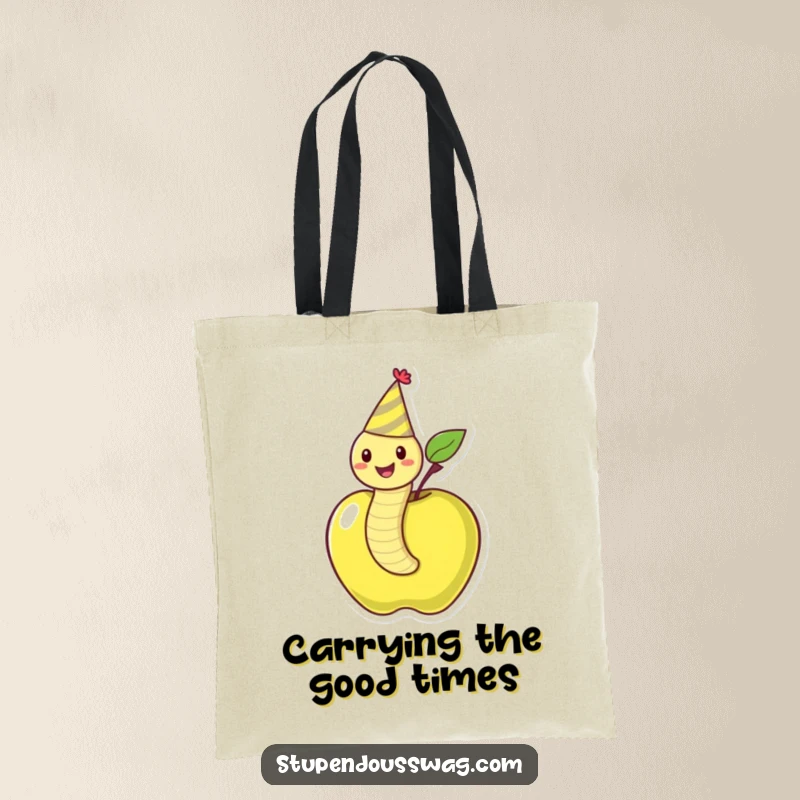 Funny tote bag illustrating a happy worm in a party hat emerging from an apple, ideal for carrying everyday items with joy.