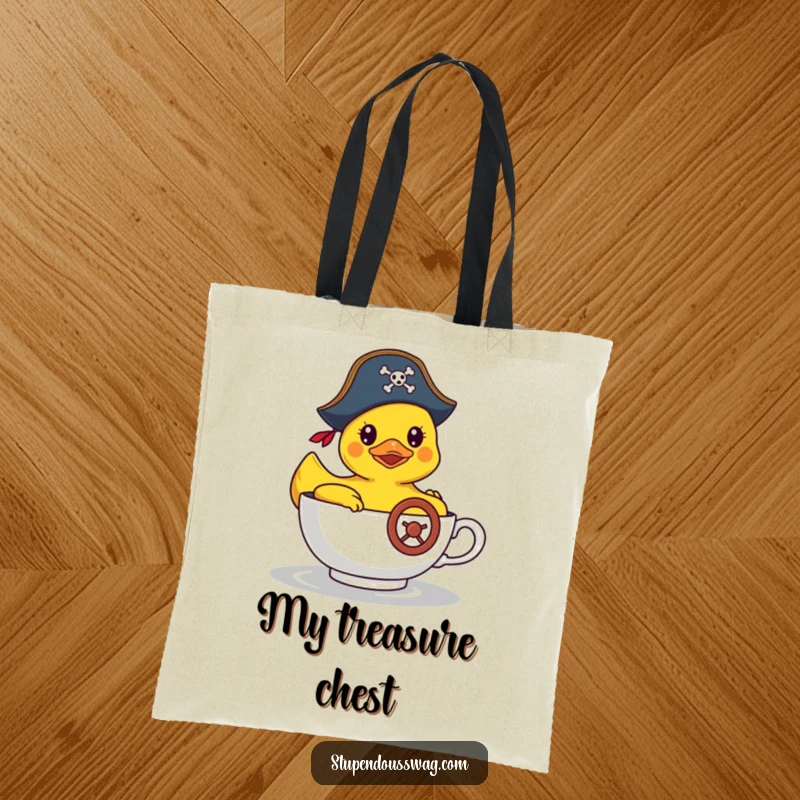 Funny tote bag with a rubber duck in a pirate hat steering a teacup, a practical and humorous accessory.