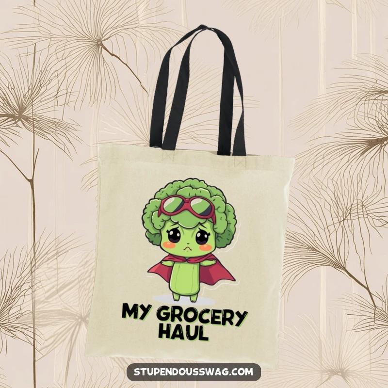 Funny bewildered broccoli tote bag with a miniature superhero cape on a charmingly confused floret.